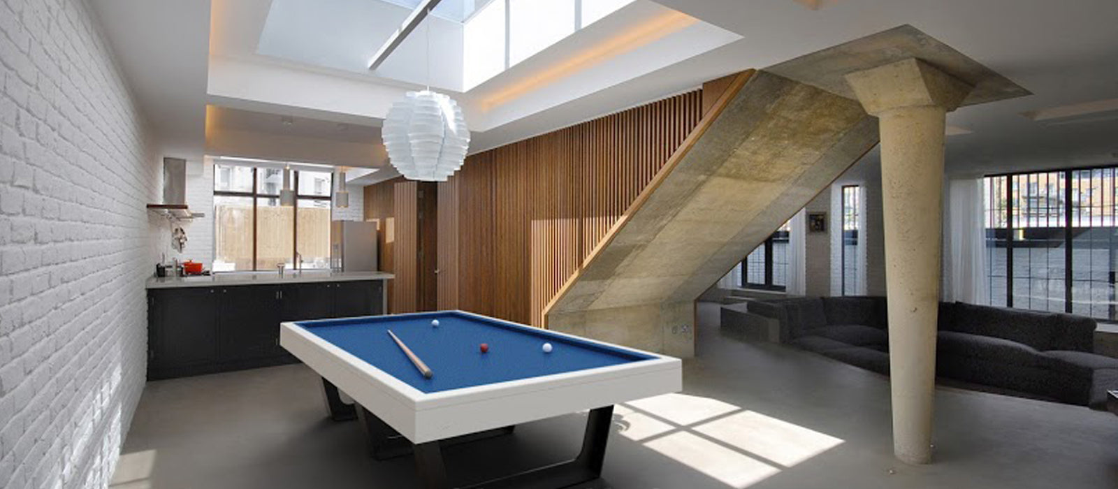 A modern pool table in a contemporary space