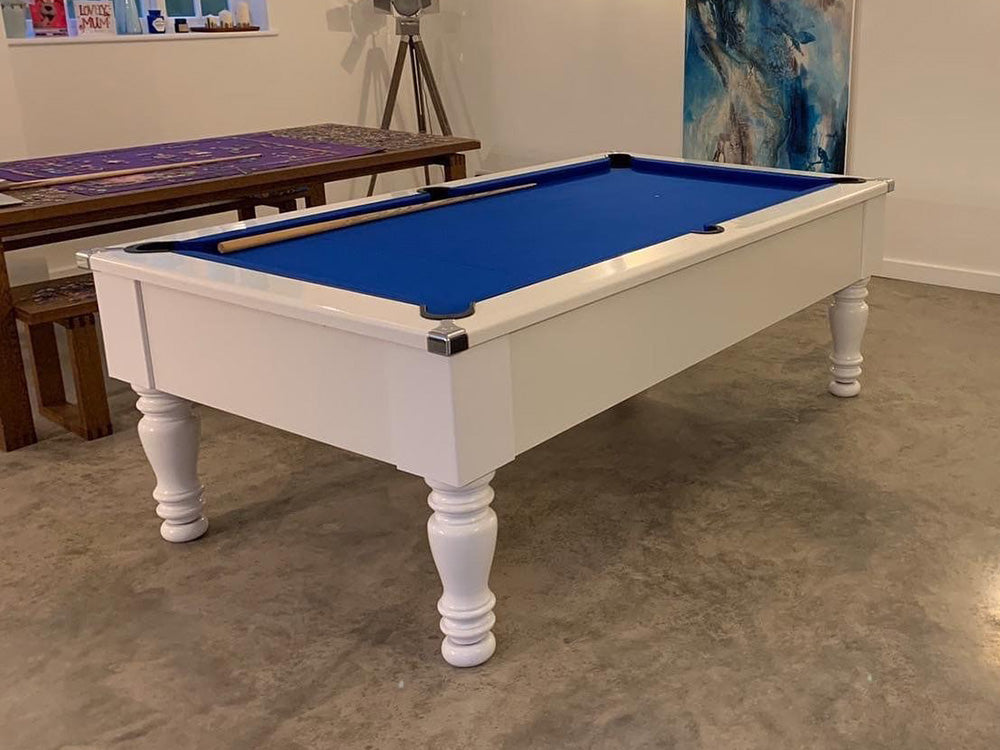 Gloss White Turned Leg Pool Table with blue cloth angled shot