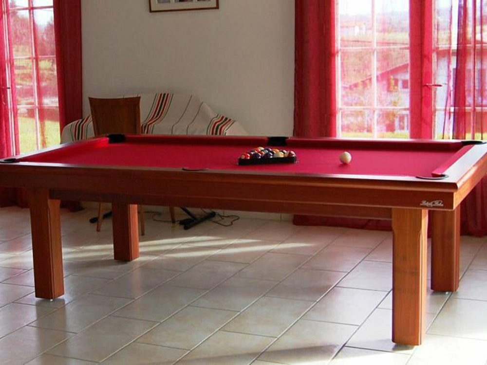 Orion pool table, in wood finish with red cloth