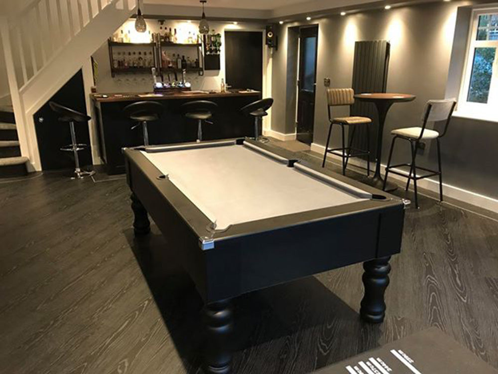 British made, solid-wood turned leg black pool table, featuring chrome corners and stunning modern matt finish. Perfect for your elegant games room.